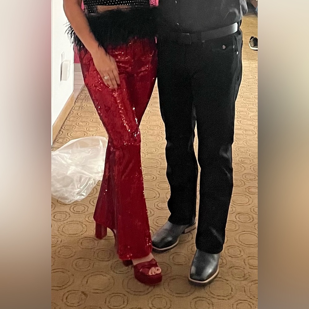 Beautiful sequins red Michael Costello pants size small wore out once .